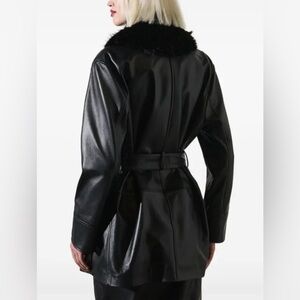 Luxurious Black Leather Jacket with Fur Collar